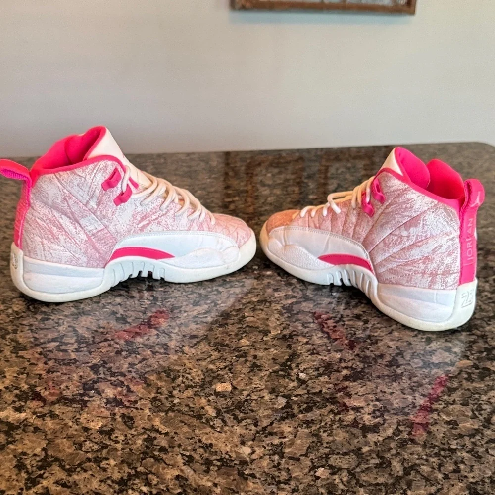 Jordan retro 12 Kids Sneakers in Pink and white 5Y or 7Womens